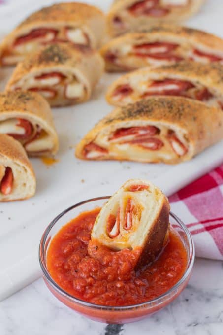 An easy appetizer or dinner with pizza dough, pepperoni and cheese.
