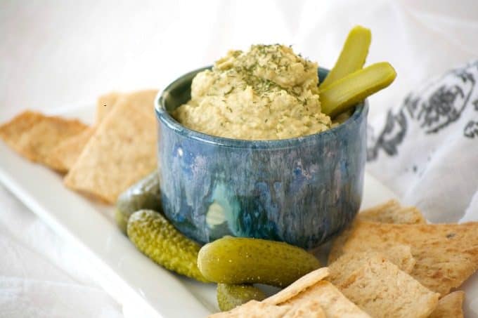 Dill Pickle Hummus is the perfect way to satisfy your craving. Chickpeas, dill pickles, and tahini make this a healthy snack you'll have trouble sharing.Â 