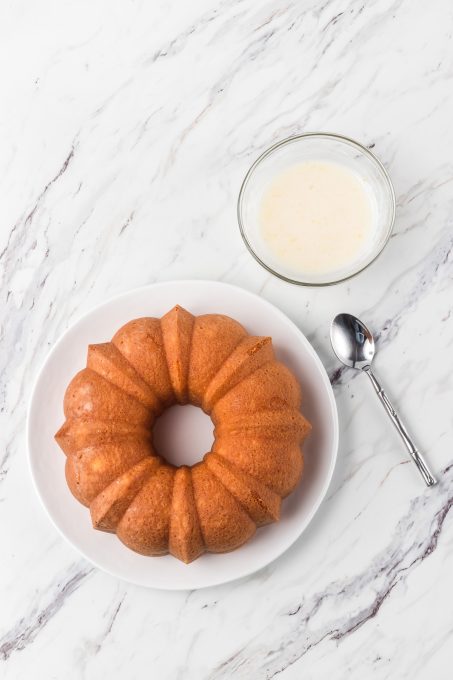 A baked Lemon Cake ready to be glazed.