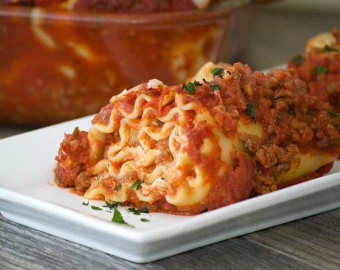 Cheese filled lasagna rolls topped with a flavorful meat sauce - a meal you can't help but share.Â Share them for your Glad to Give meal to see the smiles.