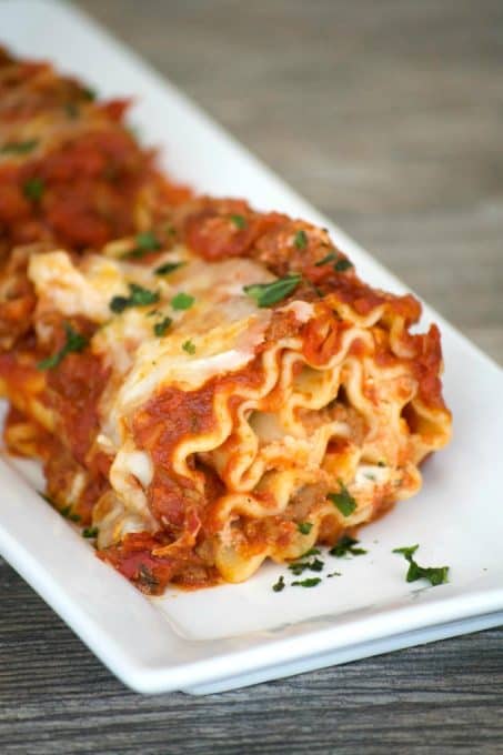 Cheese filled lasagna rolls topped with a flavorful meat sauce - a meal you can't help but share.Â Share them for your Glad to Give meal to see the smiles.