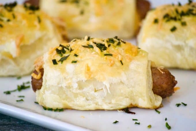 These Cheesy Puff Pastry Sausage Rolls are light and airy with delicious bites of cheese and sausage. They're an appetizing addition for any Easter brunch. 