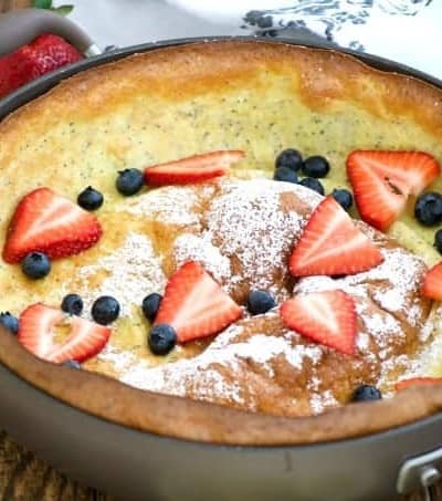 This Lemon Poppy Seed Dutch Baby is a light and fluffy pancake baked in the oven. With a light lemon flavor, it's a perfect breakfast treat for the weekend.