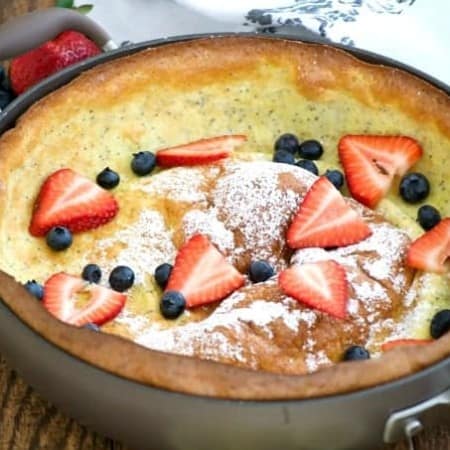 This Lemon Poppy Seed Dutch Baby is a light and fluffy pancake baked in the oven. With a light lemon flavor, it's a perfect breakfast treat for the weekend.