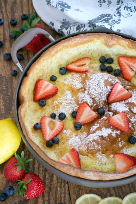 This Lemon Poppy Seed Dutch Baby is a light and fluffy pancake baked in the oven. With a light lemon flavor, it's a perfect breakfast treat for the weekend.