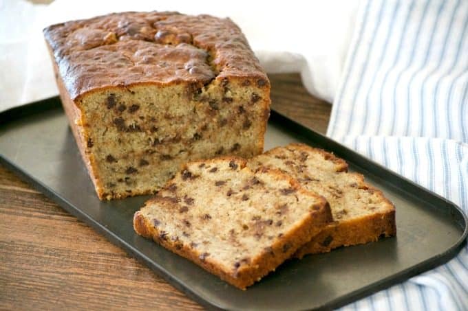Better than regular banana bread, this easy and delicious Peanut Butter Chocolate Chip Banana Bread will bring you back to Grandma's kitchen and beyond!