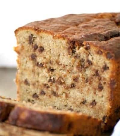 Better than regular banana bread, this easy and delicious Peanut Butter Chocolate Chip Banana Bread will bring you back to Grandma's kitchen and beyond!