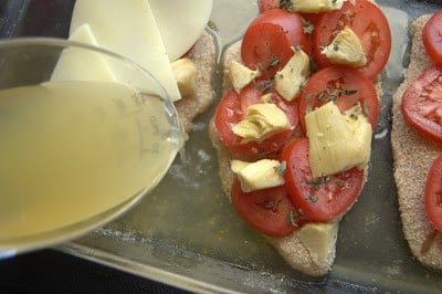 Fresh herbs, tomatoes, chicken, artichokes and cheese, make this Artichoke Tomato Chicken a super easy meal that is on the table in less than 30 minutes!