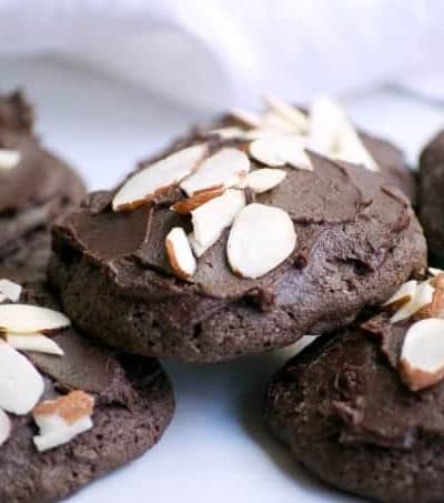 These Double Chocolate Frosted Almond Cookies, made with Fair Trade products are sure to satisfy any chocolate craving. Almond paste, sliced almonds, double chocolate chips and chocolate frosting make these cookies very hard to resist! Make them and help support Fair Trade communities. 