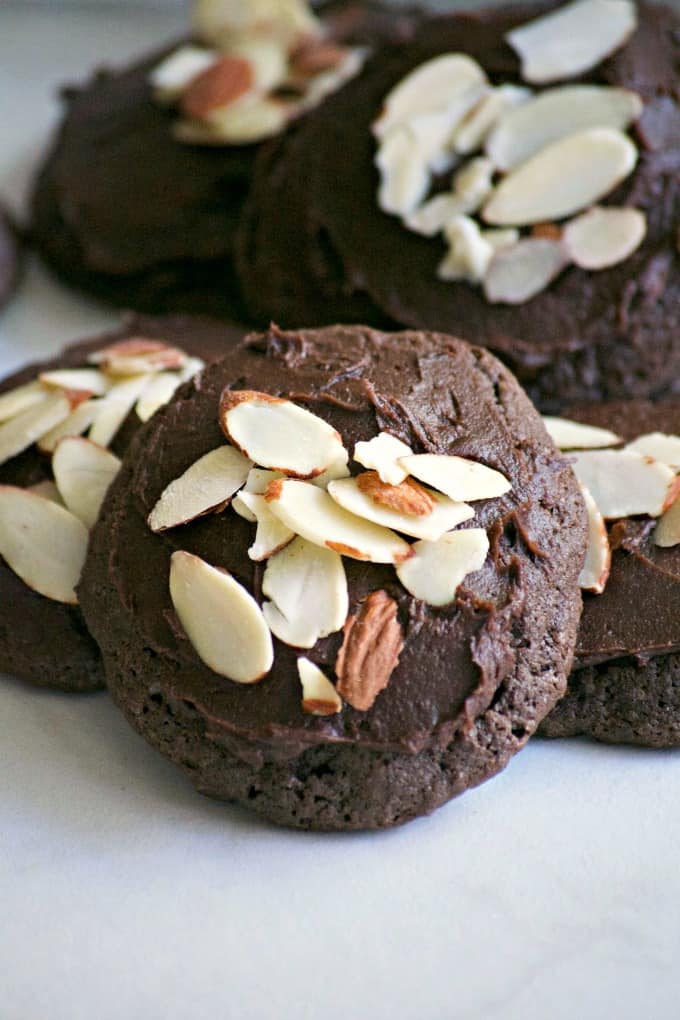 These Double Chocolate Frosted Almond Cookies, made with Fair Trade products are sure to satisfy any chocolate craving. Almond paste, sliced almonds, double chocolate chips and chocolate frosting make these cookies very hard to resist! Make them and help support Fair Trade communities. 