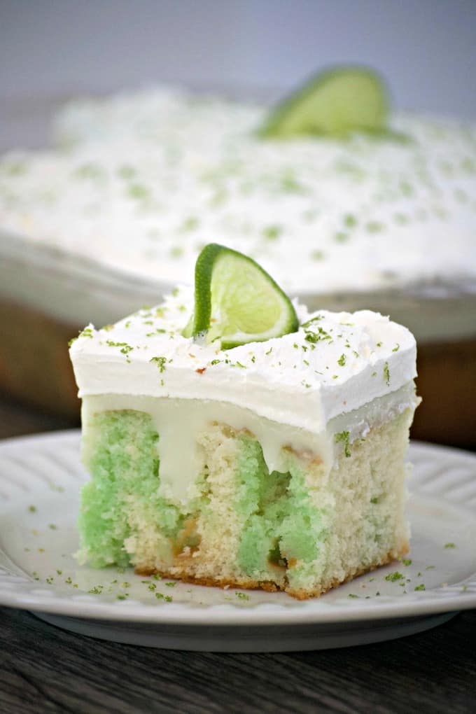 Key Lime Creme Poke Cake is THE perfect desert to top off your Cinco de Mayo party. It's SO easy to put together and is full of flavor. Lime lovers rejoice!