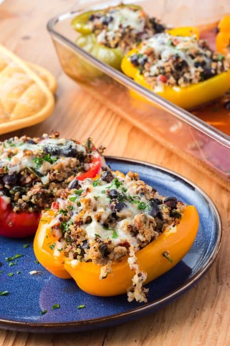 A turkey stuffed pepper with black beans and quinoa.