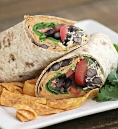 These Taco Hummus Wraps are a tasty way to change things up for Taco Tuesday and the homemade hummus is a great base for your favorite fixin's.