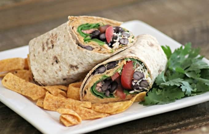 These Taco Hummus Wraps are a tasty way to change things up for Taco Tuesday and the homemade hummus is a great base for your favorite fixin's.