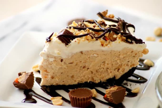 This No-Bake Peanut Butter Pie with an Oreo crust, peanut butter filling, and fresh whipped cream make it THE perfect choice for game night or any night!