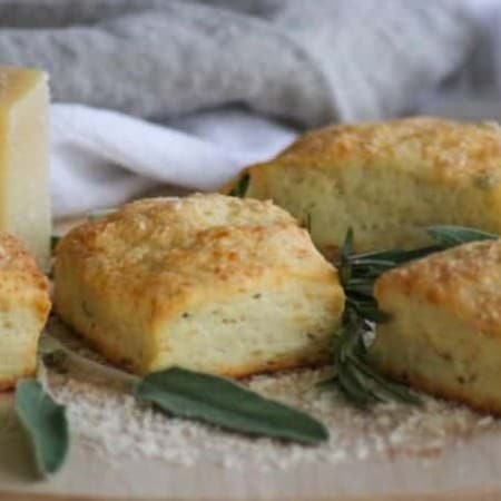 These Asiago Herb Biscuits with shredded Asiago cheese, and fresh herbs are a tasty and easy to make side dish, and they're on your table within 30 minutes!