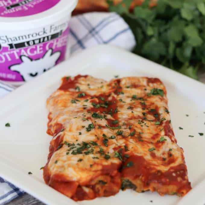 This easy Spinach and Cheese Manicotti is an old family favorite. It starts with a smooth, creamy filling made of cottage cheese, spinach, and eggs, and is rolled into a homemade crepe. Serve them with a salad and you have a delicious dinner that your family will enjoy for years to come.