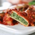 This easy Spinach and Cheese Manicotti is an old family favorite. It starts with a smooth, creamy filling made of cottage cheese, spinach, and eggs, and is rolled into a homemade crepe. Serve them with a salad and you have a delicious dinner that your family will enjoy for years to come.