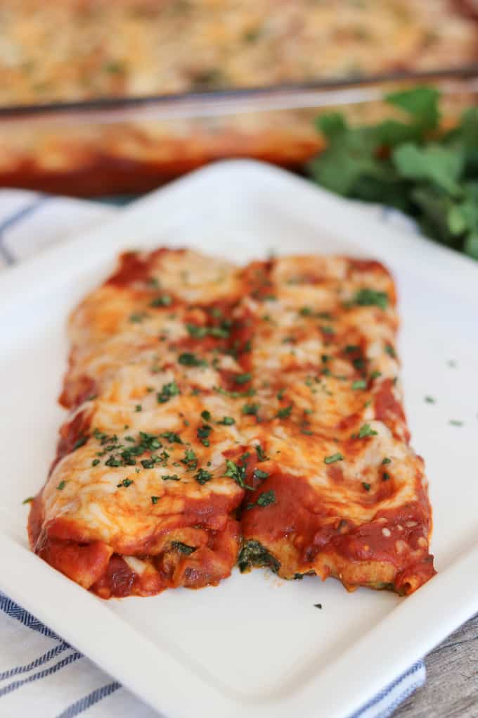 This easy Spinach and Cheese Manicotti is an old family favorite. It starts with a smooth, creamy filling made of cottage cheese, spinach, and eggs, and is rolled into a homemade crepe. Serve them with a salad and you have a delicious dinner that your family will enjoy for years to come.