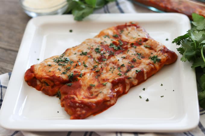 This easy Spinach and Cheese Manicotti is an old family favorite. It starts with a smooth, creamy filling made of cottage cheese, spinach, and eggs, and is rolled into a homemade crepe. Serve them with a salad and you have a delicious dinner that your family will enjoy for years to come.