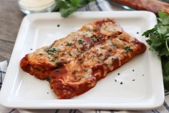 This easy Spinach and Cheese Manicotti is an old family favorite. It starts with a smooth, creamy filling made of cottage cheese, spinach, and eggs, and is rolled into a homemade crepe. Serve them with a salad and you have a delicious dinner that your family will enjoy for years to come.