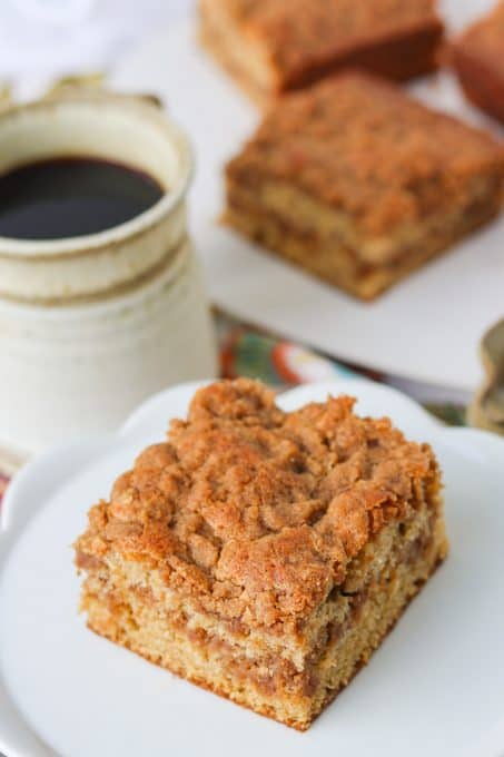 A slice of Coffee Cake made with cinnamon and sour cream.