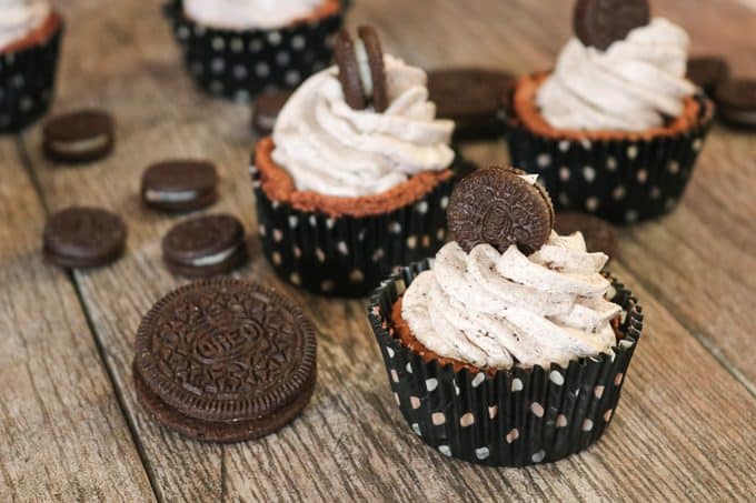 Chocolate Cookies and Cream Cheesecakes with Oreos in cupcake liners.