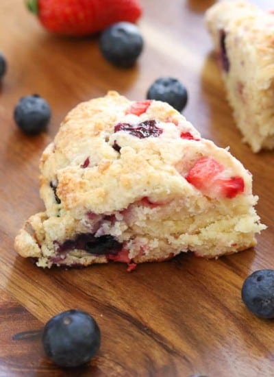 Mixed Berry Scones on wooden tray.