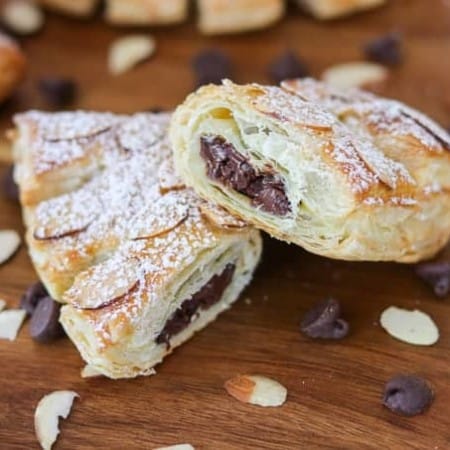 Look at all the delicious chocolate inside these Chocolate Bear Claws! They're made with puff pastry, chocolate chips, almonds and sprinkled with powdered sugar.