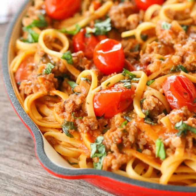 Pasta, sausage, herbs, and tomatoes are on our table in less than 30 minutes with this One Pot Sausage Linguine.
