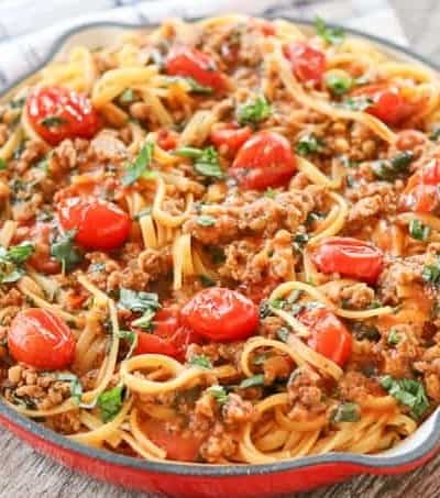 Linguine, tomatoes, sweet Italian sausage, basil, chicken stock and more make this One Pot Sausage Linguine easy to serve in less than 30 minutes.