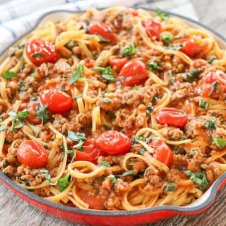 Linguine, tomatoes, sweet Italian sausage, basil, chicken stock and more make this One Pot Sausage Linguine easy to serve in less than 30 minutes.