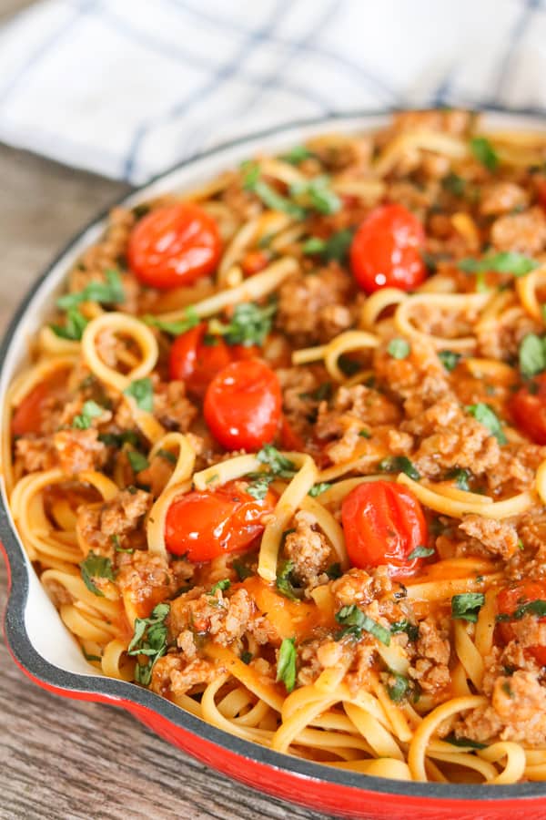 It's dinner in less than 30 minutes with this One Pot Sausage Linguine. Pasta, tomatoes, sausage and more make for a delicious and easy dinner.