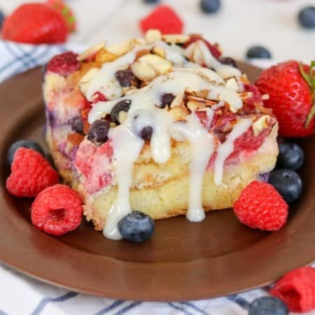 Almond Berry French Toast Casserole drizzled with Barefeet in the Kitchen's Waffle Sauce