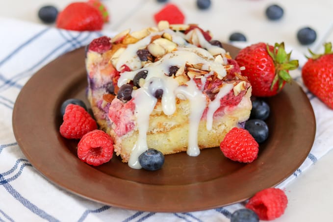 Almond Berry French Toast Casserole drizzled with Barefeet in the Kitchen's Waffle Sauce