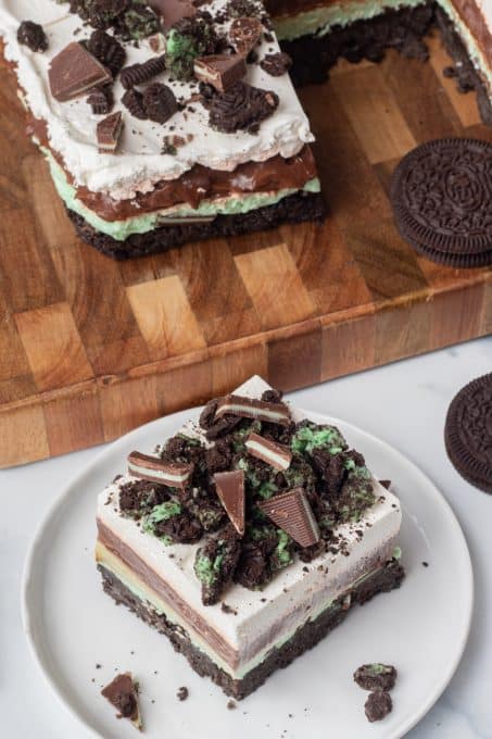 A slice of a mint Dream Bar on a plate.