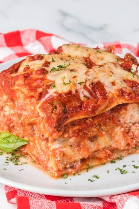 Layers of noodles, ricotta filling, cheeses, and meat sauce make up this lasagna.