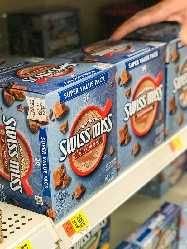 Boxes of Swiss Miss Milk Chocolate Hot Cocoa used to make Chocolate Covered Cherry Hot Chocolate. Boxes of Swiss Miss Milk Chocolate Hot Cocoa used to make Chocolate Covered Cherry Hot Chocolate.