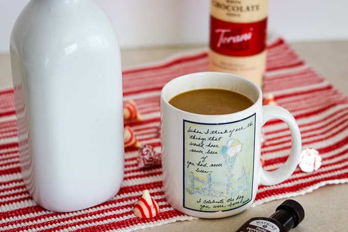 A cup of coffee with Peppermint White Chocolate Coffee Creamer.