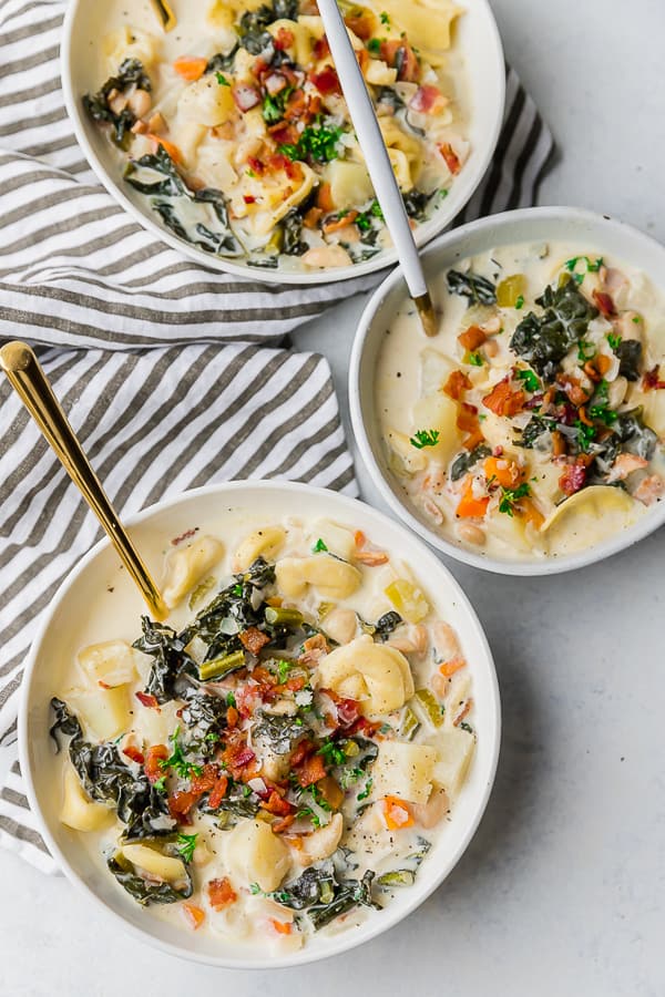 Three bowls of One Pot Bacon and Tortellini Zuppa Toscana.