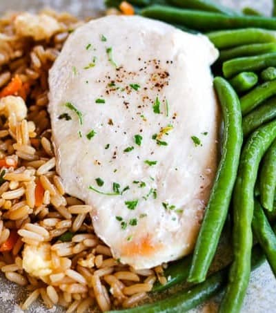 A balanced meal with Schwan's Vegetable Fried Rice, Chicken Breast Fillet and MicroSteam Whole Green Beans plated.