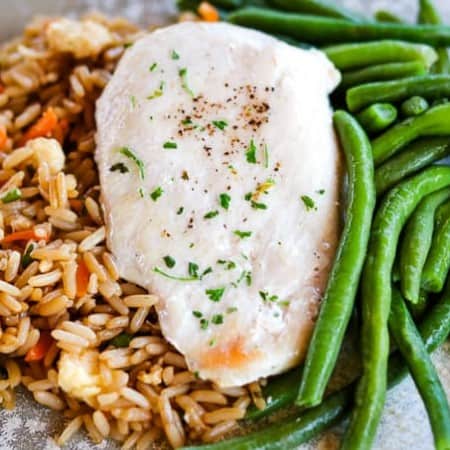 A balanced meal with Schwan's Vegetable Fried Rice, Chicken Breast Fillet and MicroSteam Whole Green Beans plated.