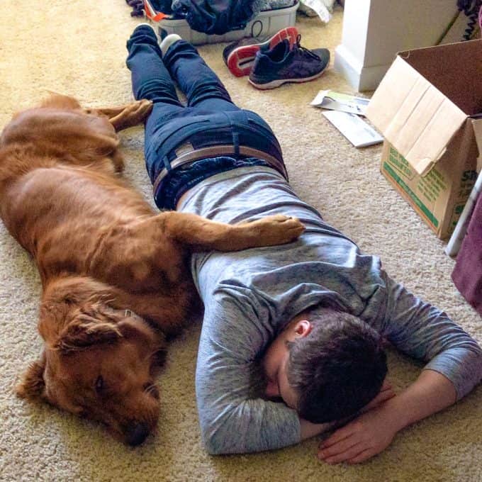 Logan the Golden Dog - Mother's Day asleep on the floor with our son.