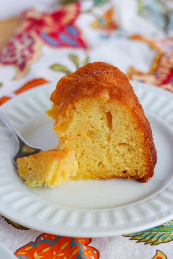A bite of Pineapple Rum Cake. A bite of Pineapple Rum Cake.