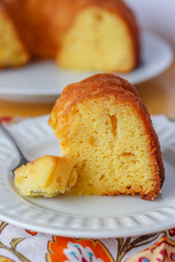 A bite of Pineapple Rum Cake on a fork.