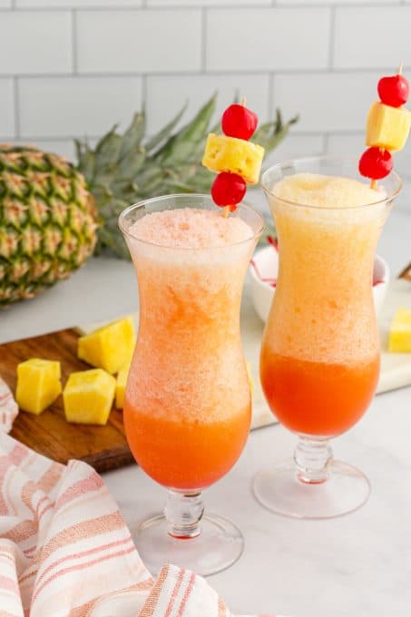 A frozen cocktail with rum, orange and pineapple juices, and grenadine.