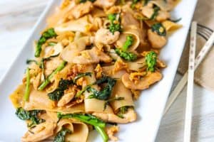 Pad See Ew with chopsticks.