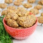 A bowl and rack of DIY Chicken and Cheese Dog Treats.