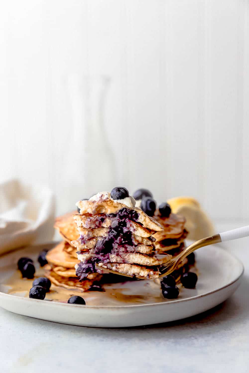 A stack of Lemon Blueberry Cottage Cheese Pancakes.