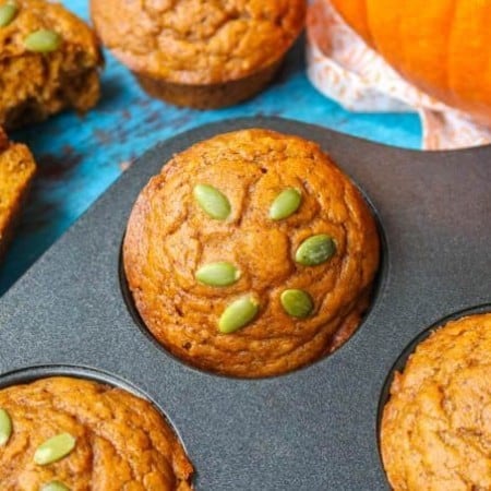 A Dairy-Free Pumpkin Muffin in a baking tin.